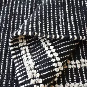 Gimie rug in charcoal and ivory