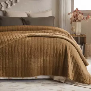 ZELIE Camel Bedspread in a bedroom