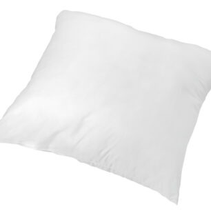 Oreiller NEST blanc en microfibre, présentation dans une chambre douce